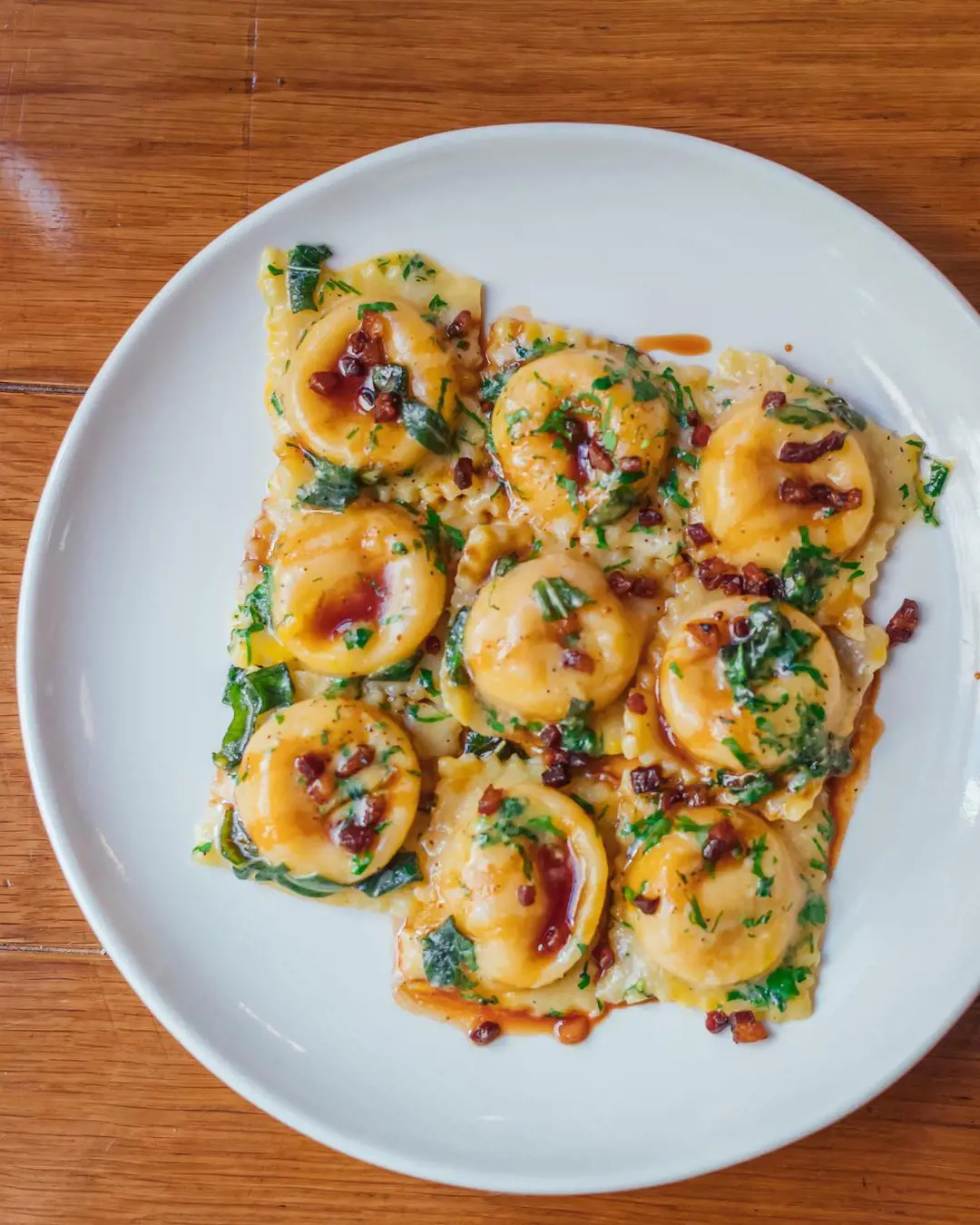 Mouthwatering Honeynut Squash Ravioli with pancetta, brown butter