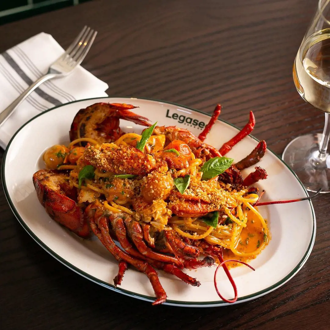 Image of one Pound Lobster Spaghetti tossed with blistered cherry tomatoes and lobster sauce