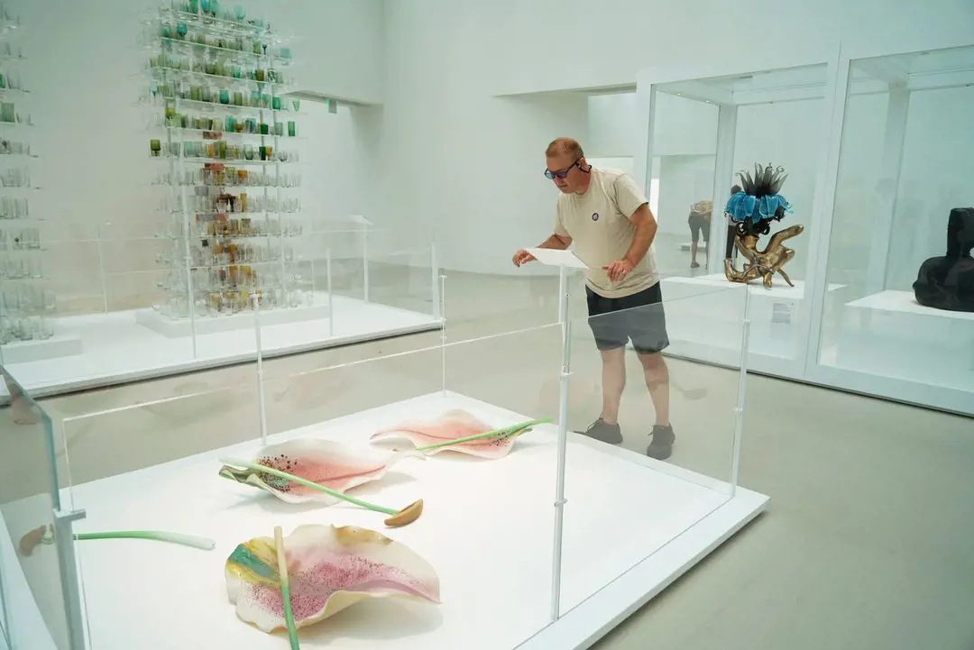 Visitor using EnChroma glasses during visit to experience all of the Museum’s vibrant details